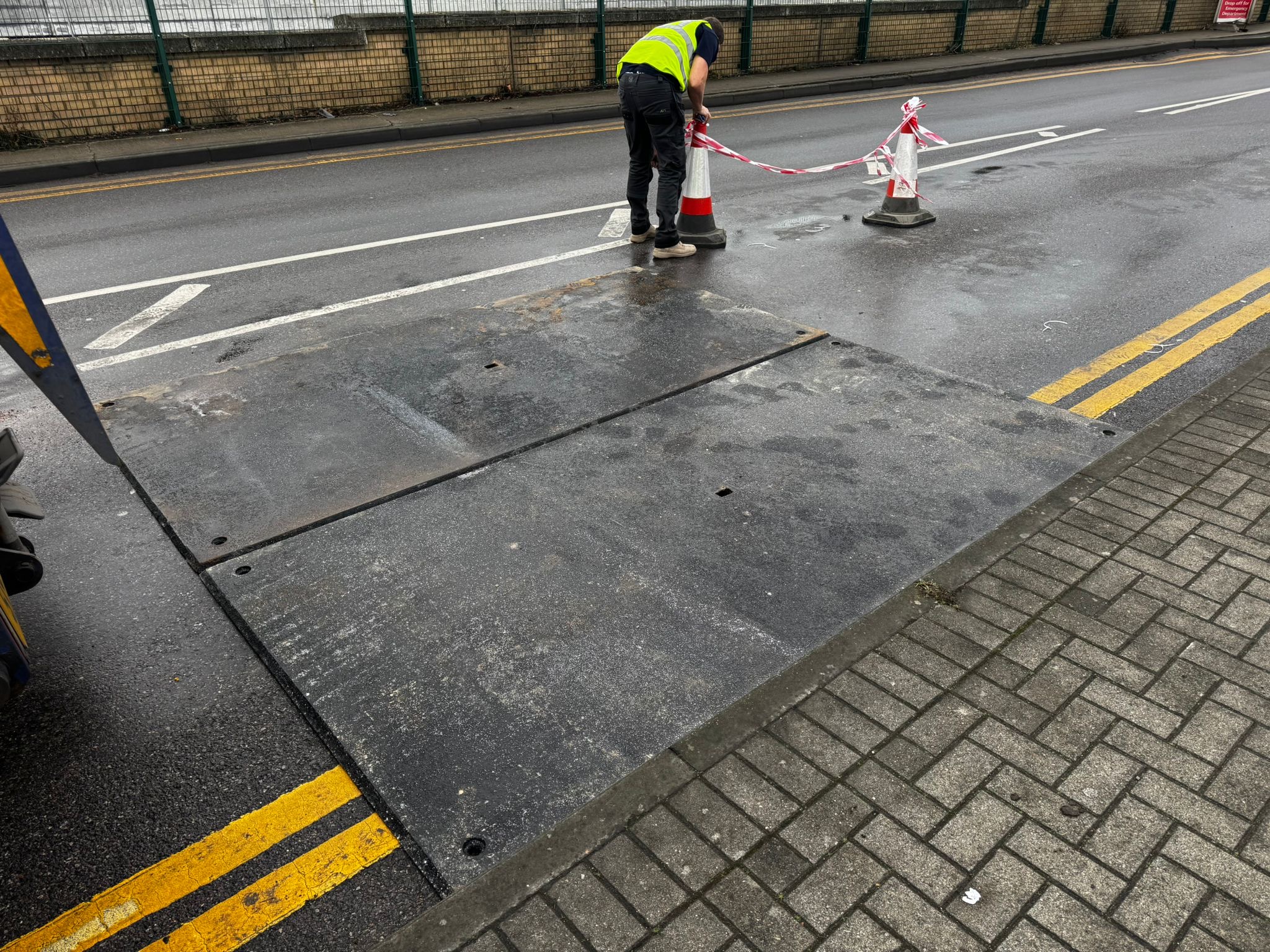 Fixing a collapsed manhole with a couple of 3x1.5 ANTISKID road plates - Road Plate Hire