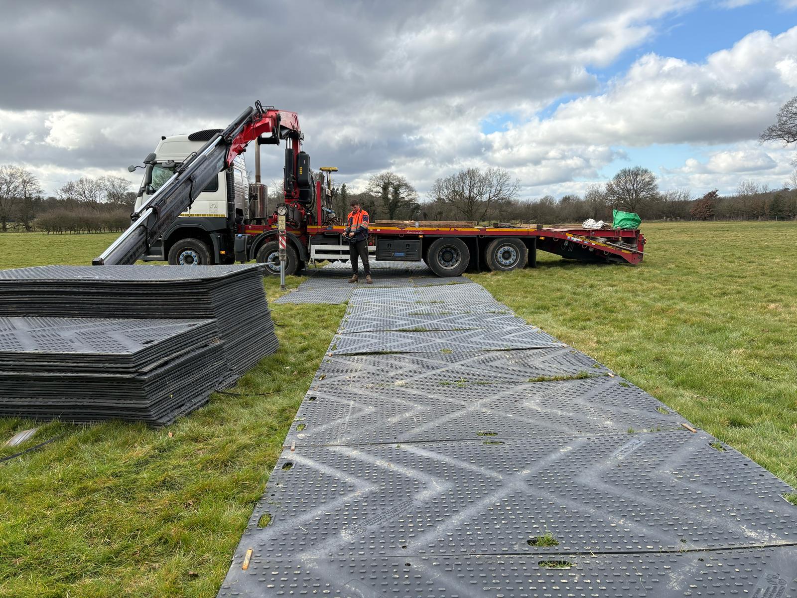 Southdown operatives laying a 260m track of Zigmats to provide a 2.5m-wide temporary road.